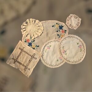 Lot of vintage embroidered table doilies